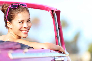 Girl in pink convertible